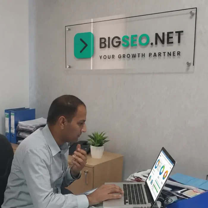Muhammad Azam working in office